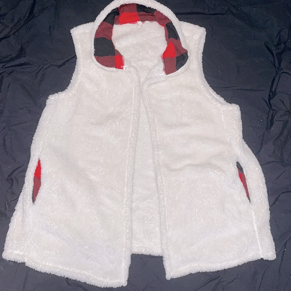 Furry white vest with red plaid accents!!! One size fits most.
